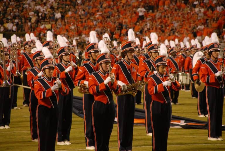 What are bowl games? This marching band and packed stadium are part of the answer