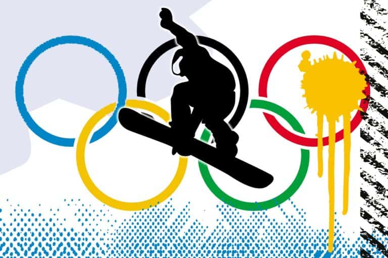 Nothing screams the Winter Olympics quite like this snowboarder in front of the Olympic rings