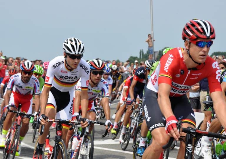 Bikers in the Tour de France race toward the finish line