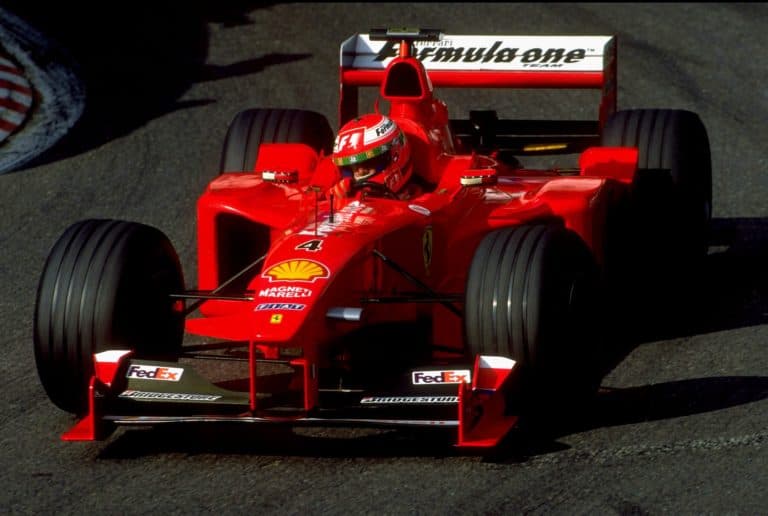 A red race car from the Ferrari team, a key part of Formula One