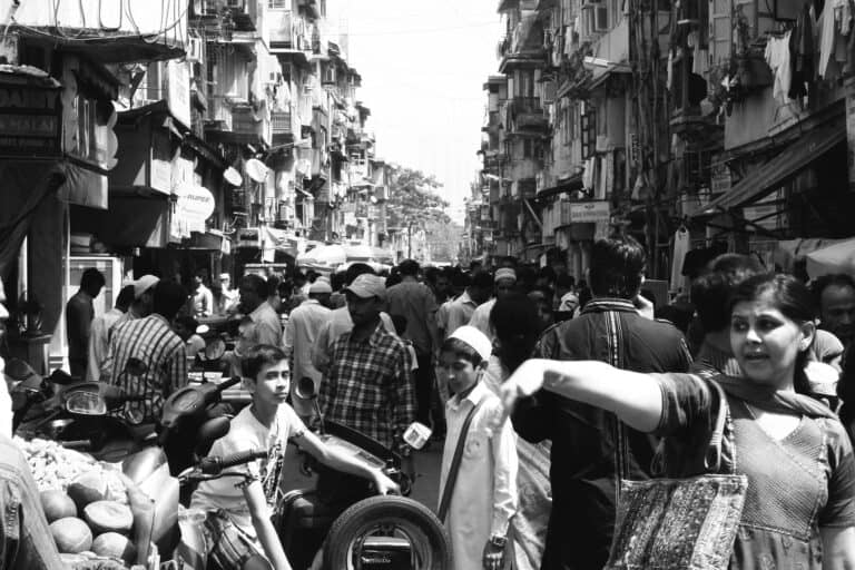 Indian demographics include the crowded streets of Mumbai, shown here