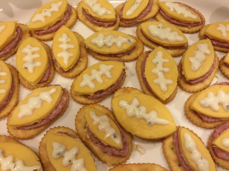 Football-shaped appetizers as would be served at a Super Bowl party