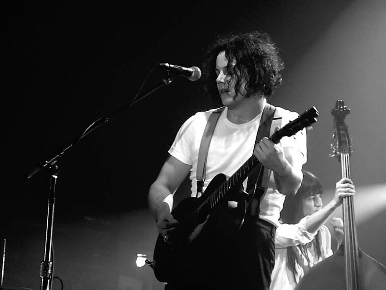 Jack White playing the guitar