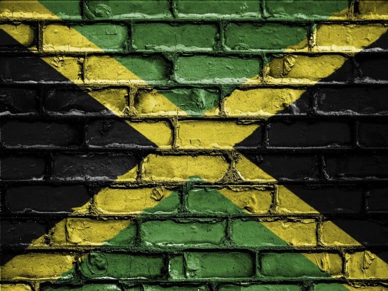 The flag of Jamaica, where Jamaican Patois is spoken