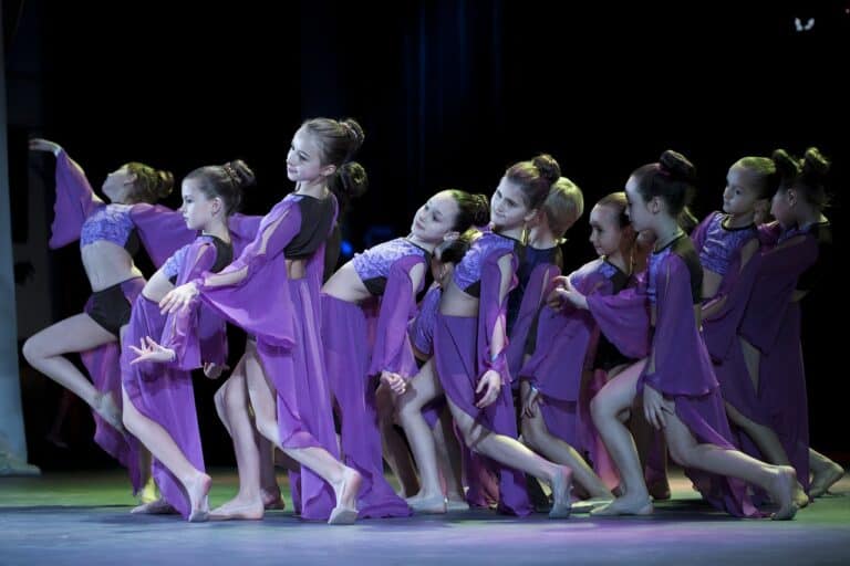 Dancers wearing purple at a youth dance competition