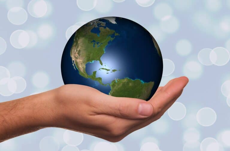 A worldly American holding the globe