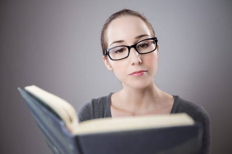 An intelligent European reading a book