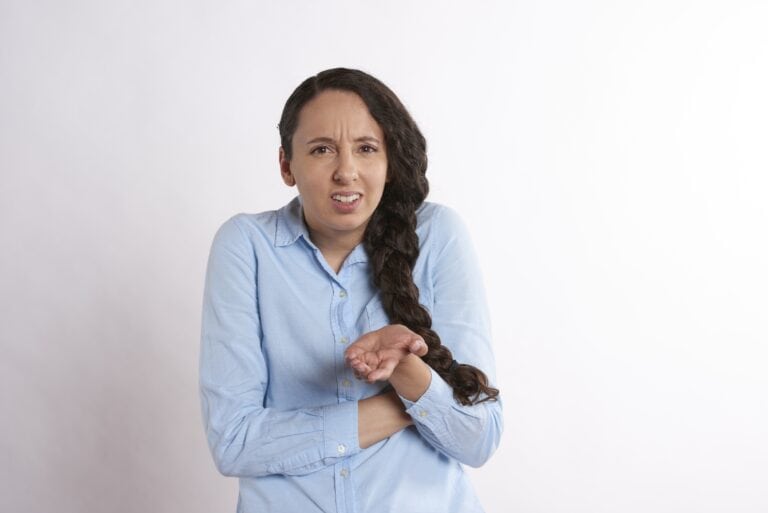 A woman expressing annoyance at election season